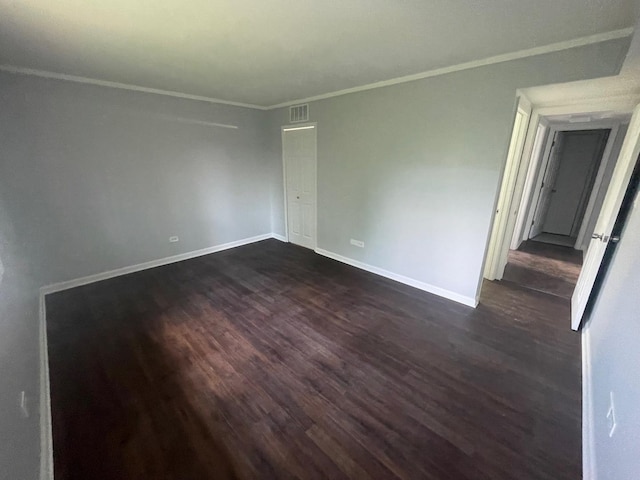 5204 Midlothian Tpke Unit 222, Crestwood, IL 60418 - unfurnished room featuring dark wood-style floors and ornamental molding