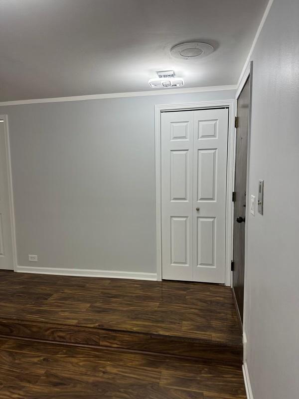 5204 Midlothian Tpke Unit 222, Crestwood, IL 60418 - hallway with dark wood-style floors and ornamental molding