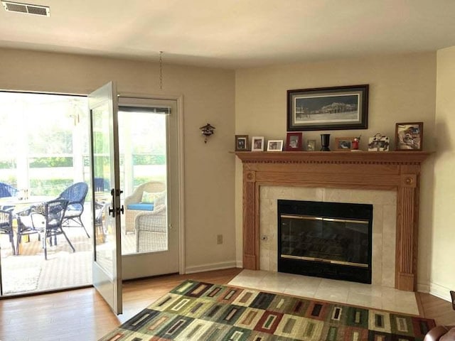W4782 Potter Rd Unit 2, Elkhorn, WI 53121 - living area featuring a fireplace and wood finished floors