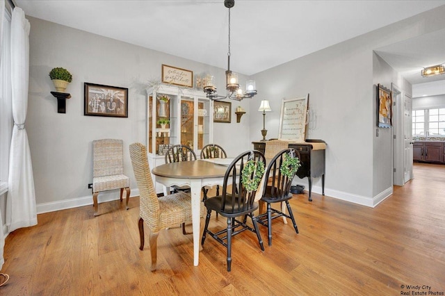 1880 Crofton Dr, Algonquin, IL 60102 - dining area featuring light wood-style floors and a chandelier