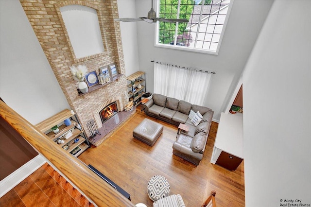 1880 Crofton Dr, Algonquin, IL 60102 - living room with a high ceiling, a fireplace, and wood finished floors