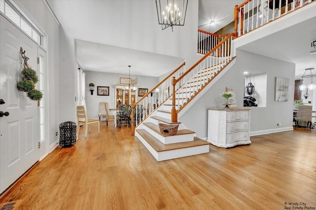 1880 Crofton Dr, Algonquin, IL 60102 - entrance foyer with a chandelier, stairway, wood finished floors, and a towering ceiling