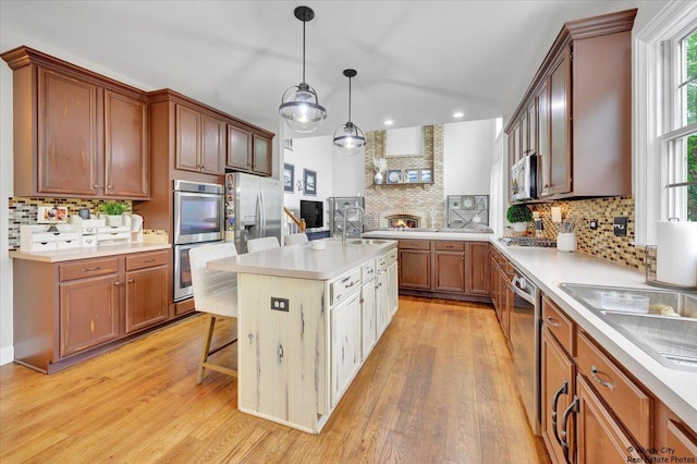 1880 Crofton Dr, Algonquin, IL 60102 - kitchen with stainless steel appliances, tasteful backsplash, light wood-style flooring, recessed lighting, and light countertops