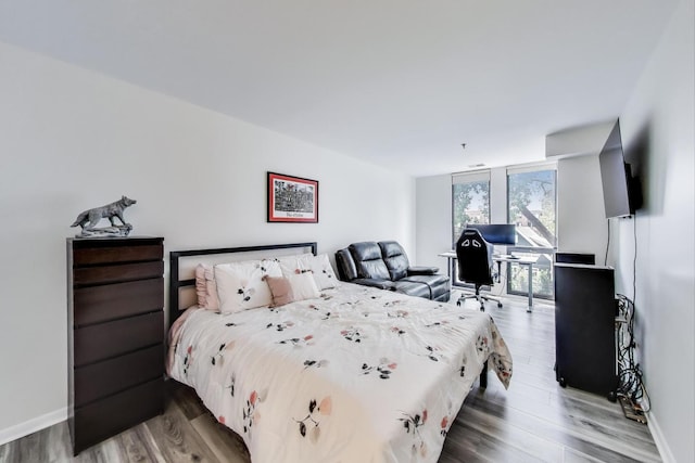 110 S Evergreen Ave Unit 4Cs, Arlington Heights, IL 60005 - bedroom featuring wood finished floors and baseboards