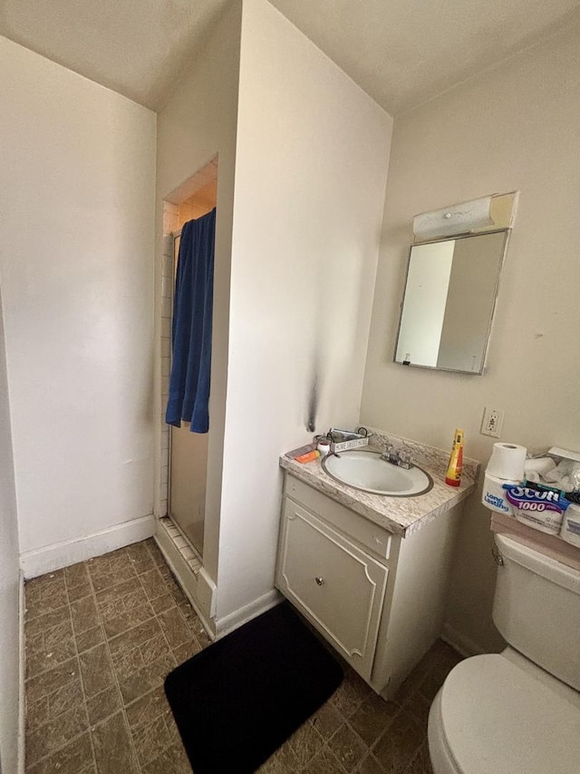 328 W Harrison St, Belvidere, IL 61008 - bathroom featuring vanity and a shower stall