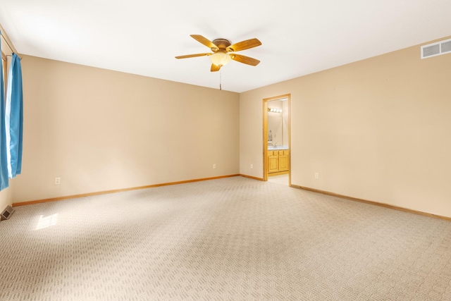 7204 Warblers Way, Roscoe, IL 61073 - spare room featuring a ceiling fan and light carpet