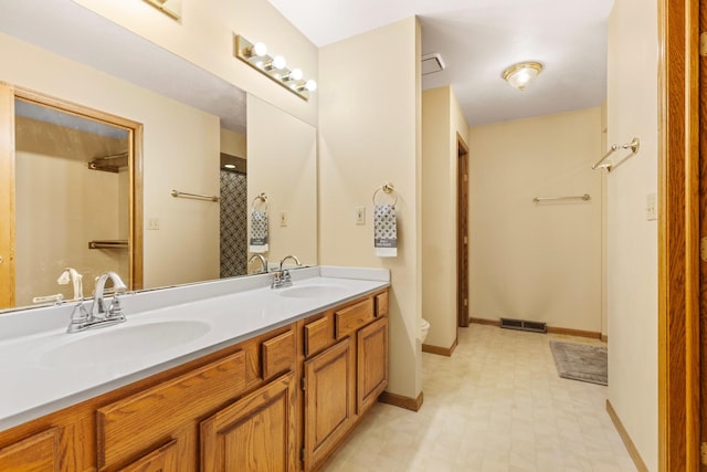 7204 Warblers Way, Roscoe, IL 61073 - full bathroom with double vanity and a shower with curtain