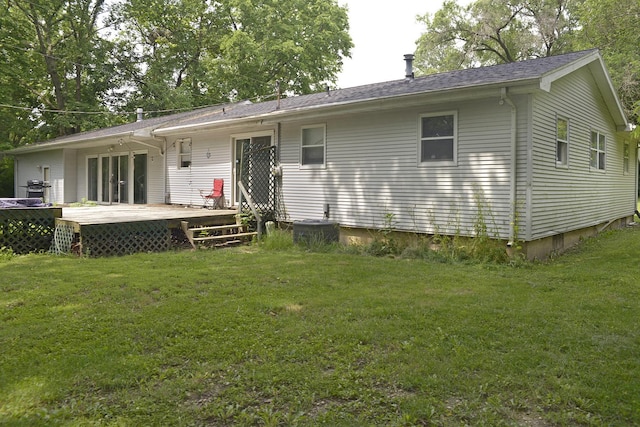 1400 Maple Ln, Marseilles, IL 61341 - rear view of house featuring a wooden deck, a lawn, and a shingled roof