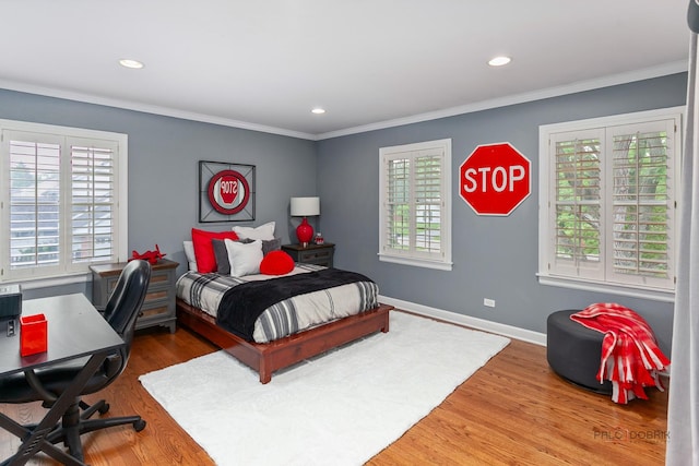 1819 Farm Rd, Lake Forest, IL 60045 - bedroom featuring multiple windows, ornamental molding, recessed lighting, a desk, and wood finished floors