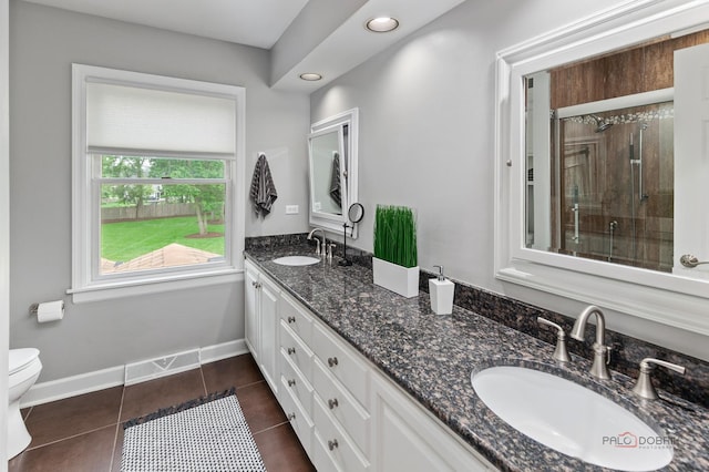 1819 Farm Rd, Lake Forest, IL 60045 - full bath with double vanity, a stall shower, tile patterned floors, and recessed lighting