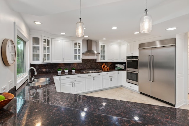 1819 Farm Rd, Lake Forest, IL 60045 - kitchen featuring stainless steel appliances, wall chimney exhaust hood, hanging light fixtures, tasteful backsplash, and recessed lighting