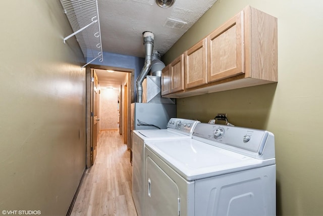 7914 164th Ct Unit 0, Tinley Park, IL 60477 - laundry area with washing machine and dryer, cabinet space, and light wood-style floors
