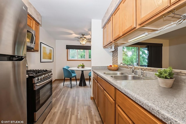 7914 164th Ct Unit 0, Tinley Park, IL 60477 - kitchen featuring appliances with stainless steel finishes, light wood-type flooring, light countertops, and ceiling fan