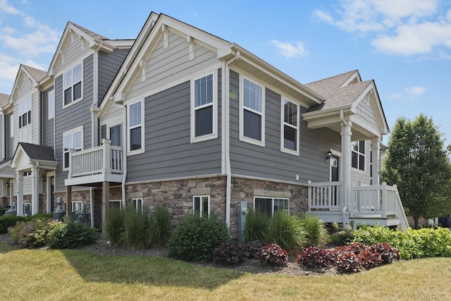 170 Goldenrod Dr, Elgin, IL 60124 - view of property exterior with a yard and stone siding
