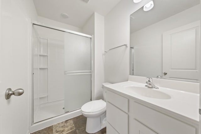 170 Goldenrod Dr, Elgin, IL 60124 - bathroom with a shower stall, vanity, and stone finish floors