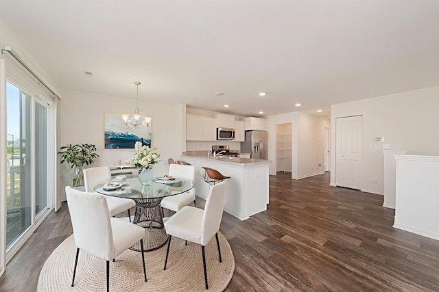 170 Goldenrod Dr, Elgin, IL 60124 - dining area with dark wood-type flooring, a chandelier, and recessed lighting