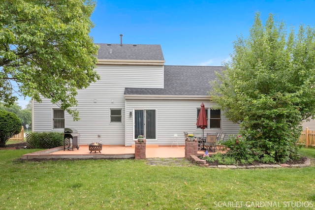 3100 Compton Rd, Aurora, IL 60504 - back of property with a patio area, a shingled roof, and an outdoor fire pit