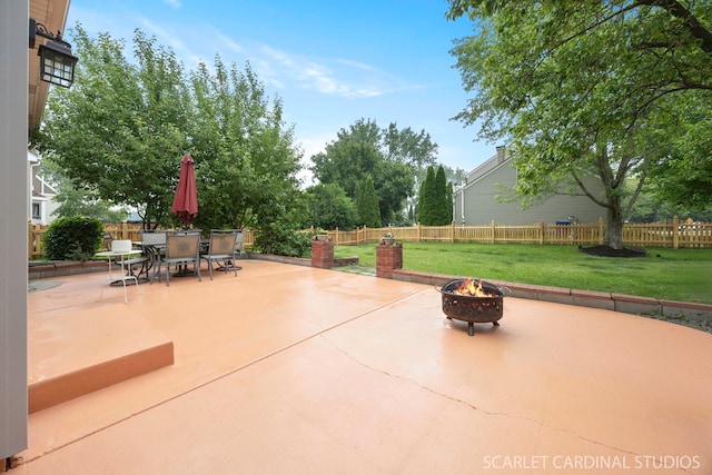 3100 Compton Rd, Aurora, IL 60504 - fenced backyard with a fire pit and a patio