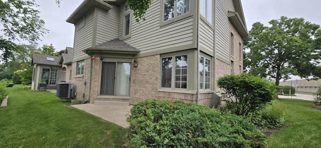 1410 49th Ct, Western Springs, IL 60558 - property entrance with brick siding, a lawn, and a patio