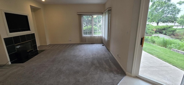 1410 49th Ct, Western Springs, IL 60558 - unfurnished living room with carpet floors, a fireplace, and a water view