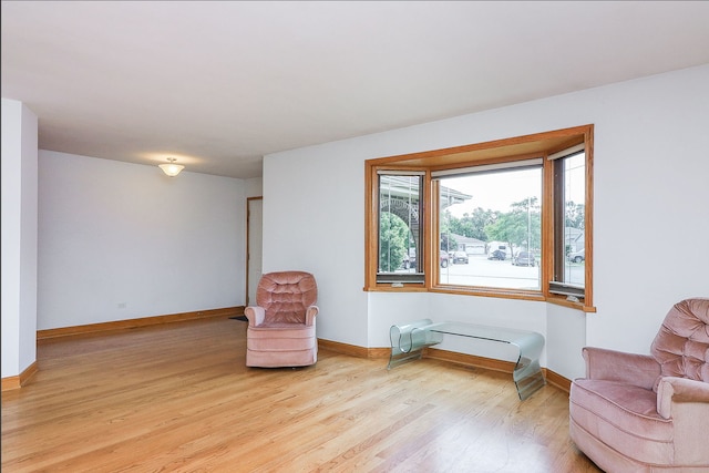 5135 W 113th Pl, Alsip, IL 60803 - sitting room featuring wood finished floors and baseboards