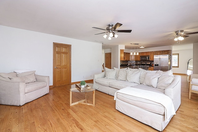 5135 W 113th Pl, Alsip, IL 60803 - living room with a ceiling fan and light wood finished floors