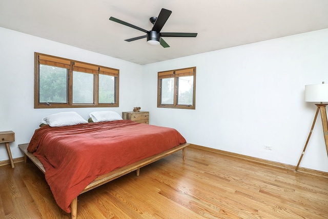 5135 W 113th Pl, Alsip, IL 60803 - bedroom with light wood-style flooring and a ceiling fan