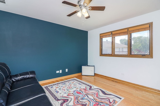 5135 W 113th Pl, Alsip, IL 60803 - living area featuring wood finished floors and a ceiling fan