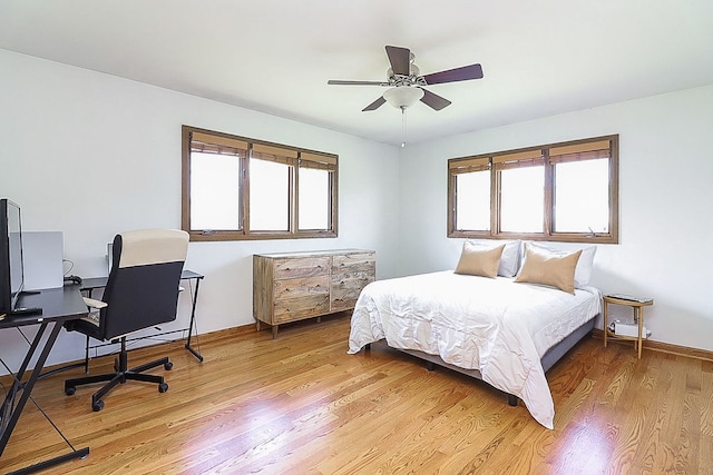 5135 W 113th Pl, Alsip, IL 60803 - bedroom with light wood-type flooring, an office area, and a ceiling fan
