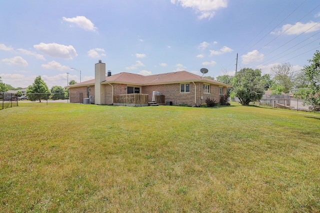 5135 W 113th Pl, Alsip, IL 60803 - back of house featuring brick siding, a chimney, and a deck
