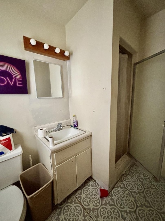1027 Strawberry Ln, Belvidere, IL 61008 - full bath featuring vanity, a shower stall, and tile patterned floors