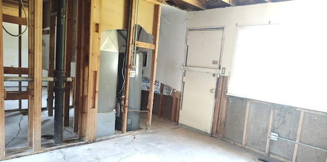 misc room with concrete flooring