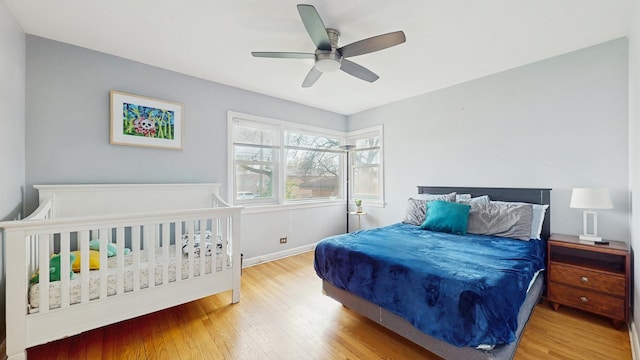 1712 Dobson St, Evanston, IL 60202 - bedroom featuring wood finished floors and ceiling fan