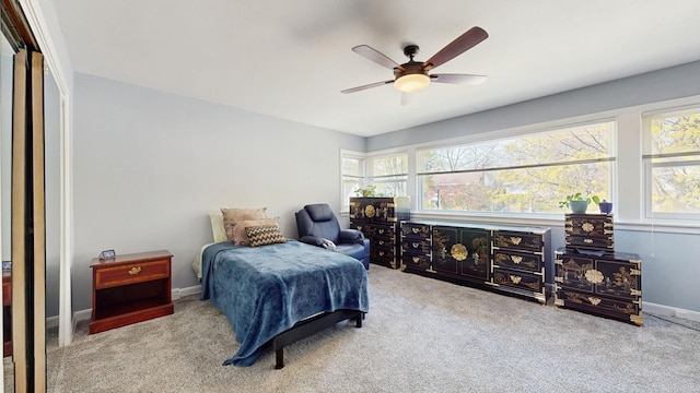 1712 Dobson St, Evanston, IL 60202 - carpeted bedroom with multiple windows and ceiling fan