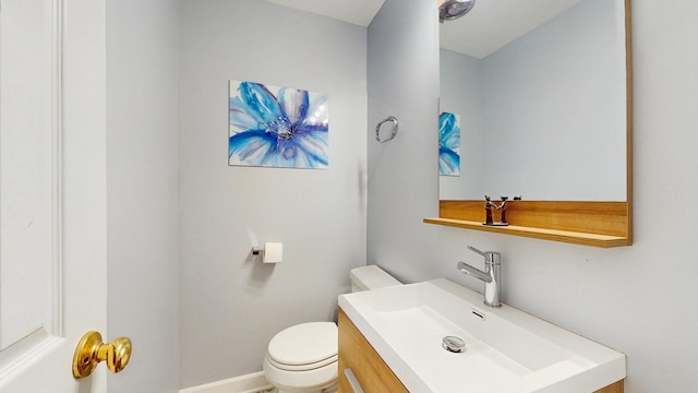 1712 Dobson St, Evanston, IL 60202 - bathroom featuring vanity and toilet