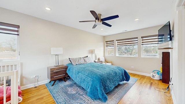 1712 Dobson St, Evanston, IL 60202 - bedroom with wood finished floors, recessed lighting, and a ceiling fan