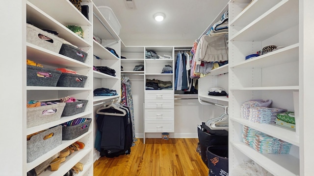 1712 Dobson St, Evanston, IL 60202 - spacious closet with light wood-style floors