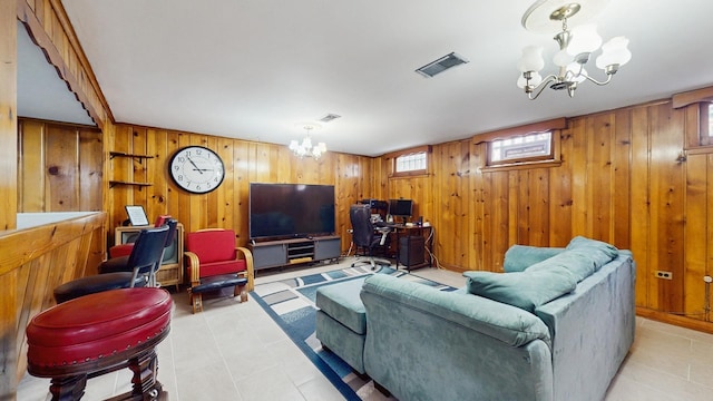 1712 Dobson St, Evanston, IL 60202 - living room with a chandelier, wood walls, a desk, and light tile patterned floors