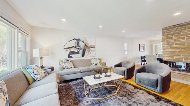 1712 Dobson St, Evanston, IL 60202 - living area with wood finished floors, healthy amount of natural light, and recessed lighting