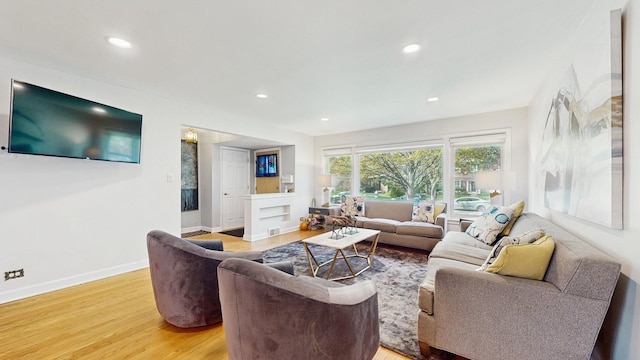 1712 Dobson St, Evanston, IL 60202 - living area featuring light wood-style floors and recessed lighting