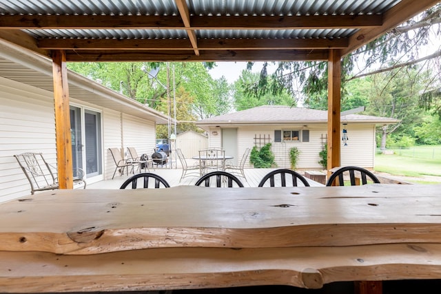 4265 Town Hall Rd, Belvidere, IL 61008 - wooden terrace featuring outdoor dining area, a shed, and grilling area