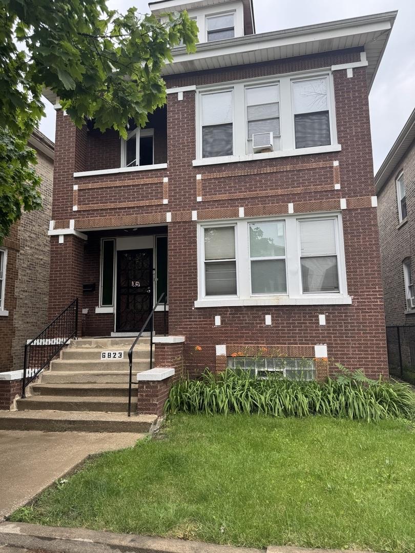 6823 S Talman Ave, Chicago, IL 60629 - american foursquare style home featuring brick siding, a balcony, and cooling unit