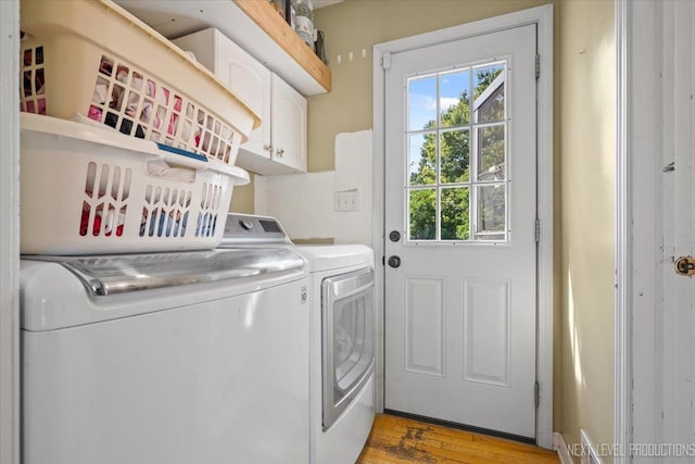 932 S Batavia Ave, Geneva, IL 60134 - laundry room with washer and dryer, cabinet space, and light wood finished floors