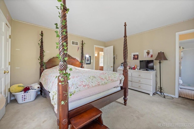 932 S Batavia Ave, Geneva, IL 60134 - bedroom featuring light carpet and connected bathroom