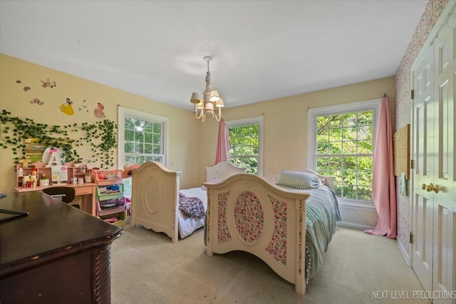 932 S Batavia Ave, Geneva, IL 60134 - bedroom with a chandelier and light colored carpet