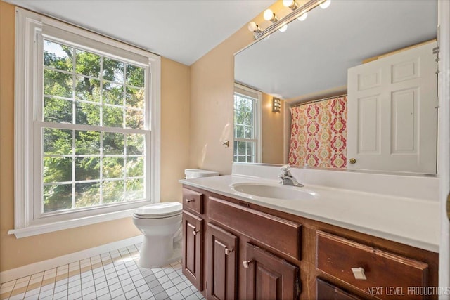 932 S Batavia Ave, Geneva, IL 60134 - full bathroom featuring vanity, tile patterned flooring, plenty of natural light, and a shower with shower curtain