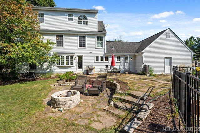 932 S Batavia Ave, Geneva, IL 60134 - back of property with an outdoor fire pit and a patio
