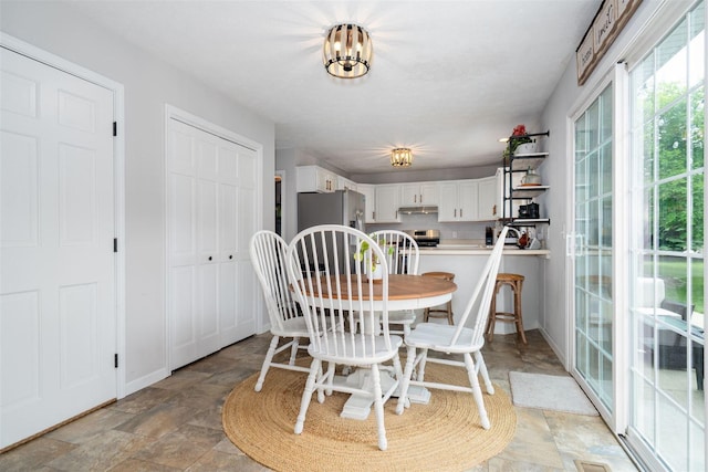 1098 Ironwood Cc Dr, Normal, IL 61761 - dining space with stone finish flooring and baseboards