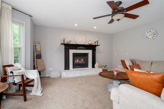 1098 Ironwood Cc Dr, Normal, IL 61761 - carpeted living room with a fireplace, a ceiling fan, and recessed lighting