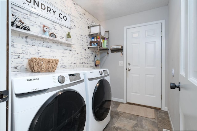 1098 Ironwood Cc Dr, Normal, IL 61761 - laundry area with independent washer and dryer and stone finish floors